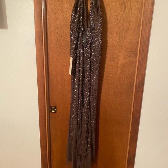 Adrianna Papell Halterneck
Fully Beaded Gown. - Picture 7 of 9